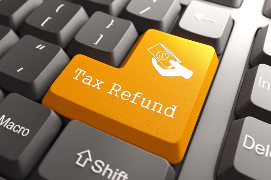 Tax Refund - Orange Button. Tax return thoughts for Minnesota small businesses.